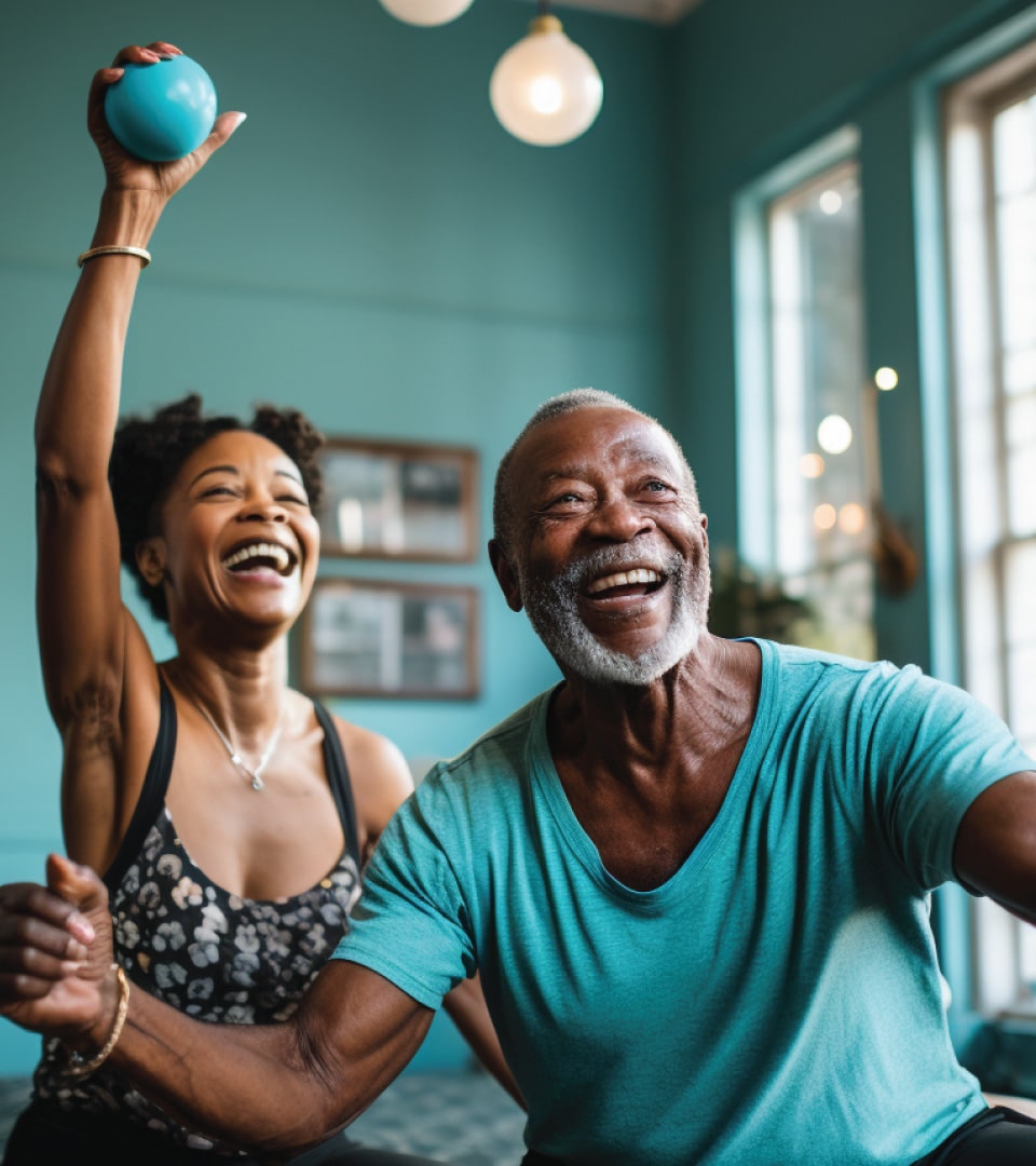 Cubii brand world lifestyle photography showing two adults laughing and exercising together representing inclusive wellness positioning by Kaleidoscope