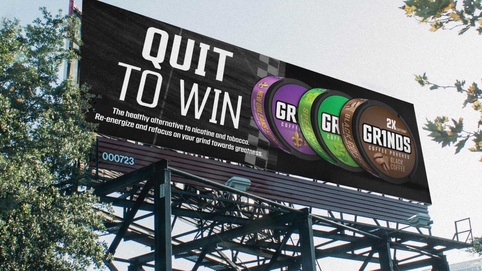 Grinds Coffee Pouches Quit to Win outdoor billboard brand activation showing updated packaging portfolio by Kaleidoscope