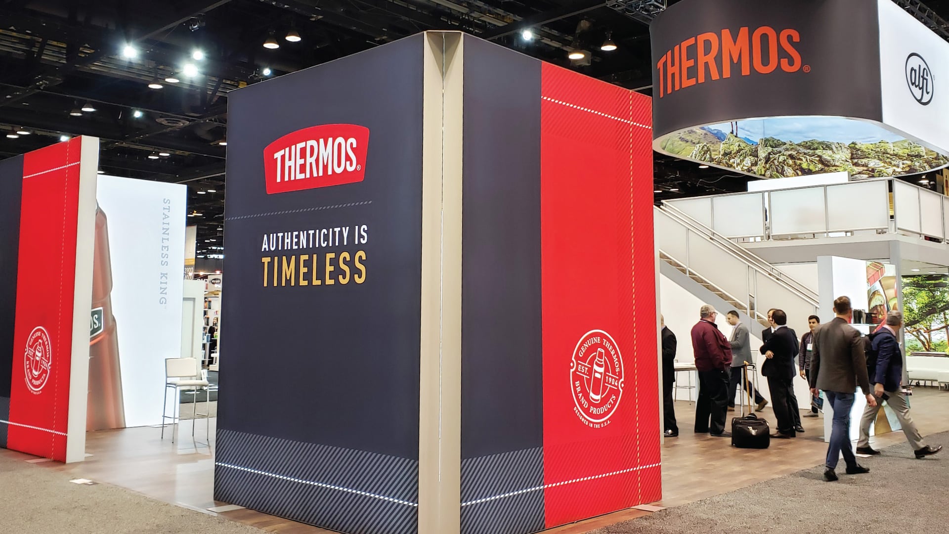 Thermos trade show booth designed by Kaleidoscope featuring "Authenticity is Timeless" brand messaging and red and navy brand identity system