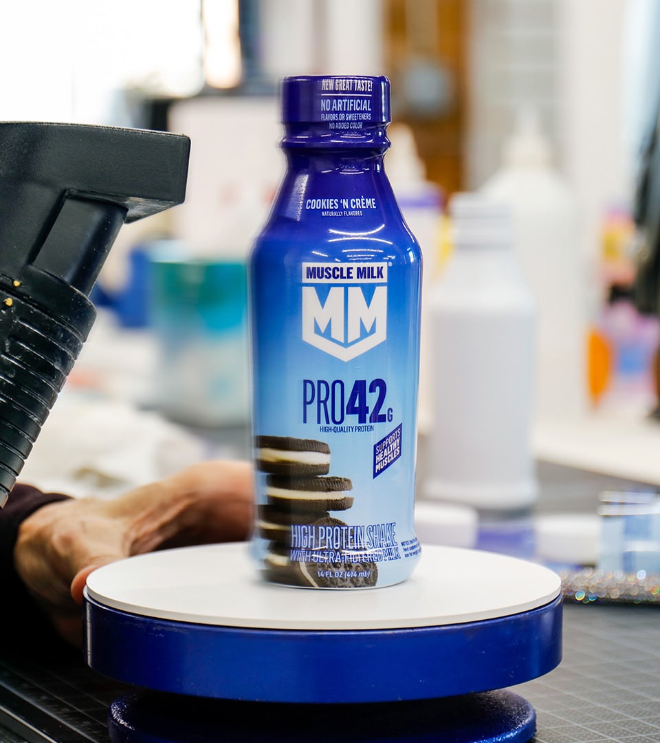 Muscle Milk packaging mockup and shrink label application by Kaleidoscope
